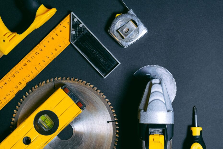 A selection of construction hand tools arranged flat lay style on a dark surface. Ideal for indus... (Photo by Anna Shvets on Pexels)